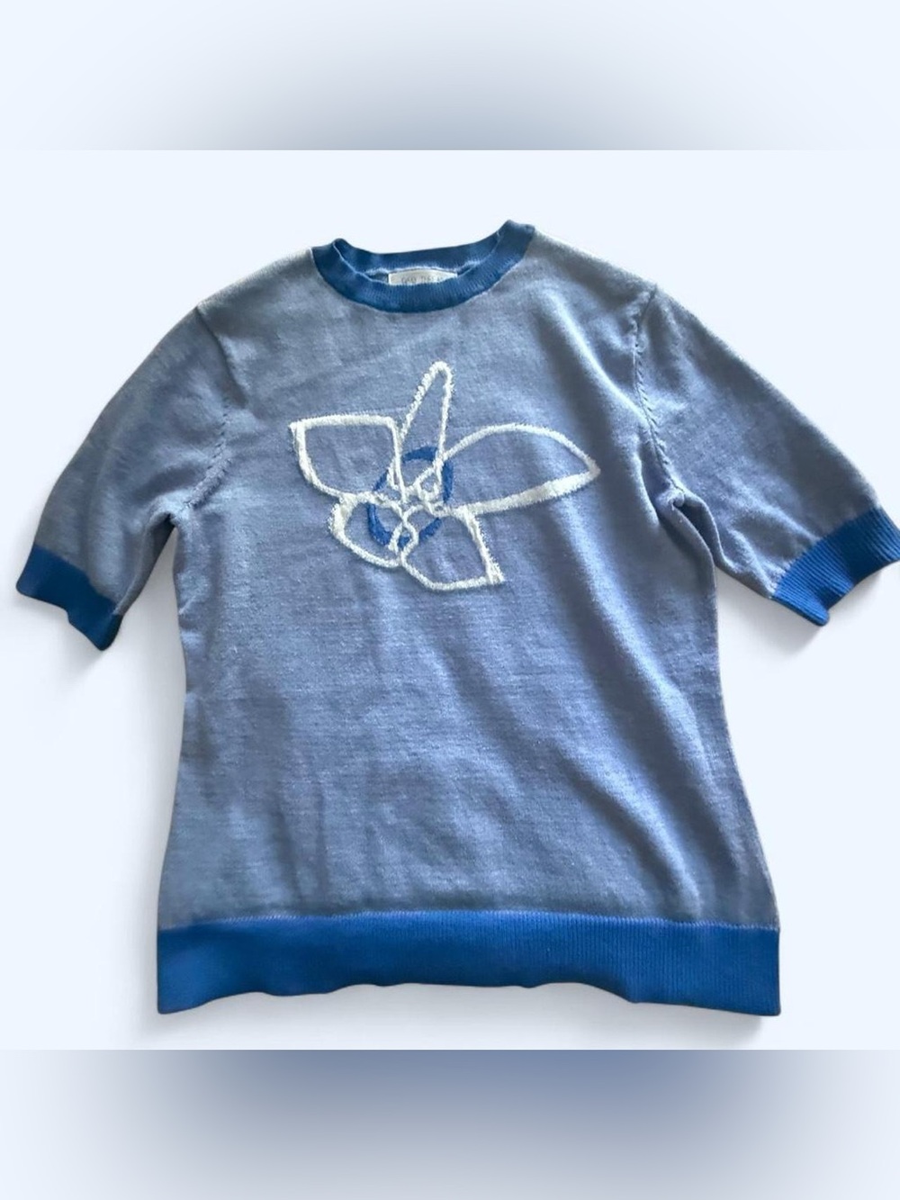 Light Blue Short-Sleeve Sweater with White Floral Motif